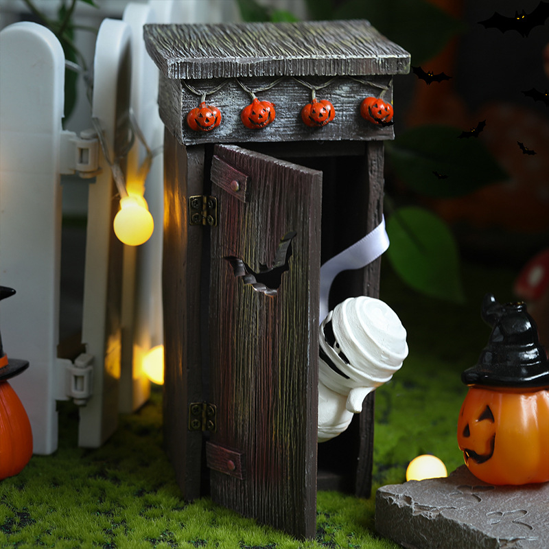 Halloween műgyanta dekoráció: vécés múmia – törpe, újságot olvas, modern minimalista stílus, Bindian