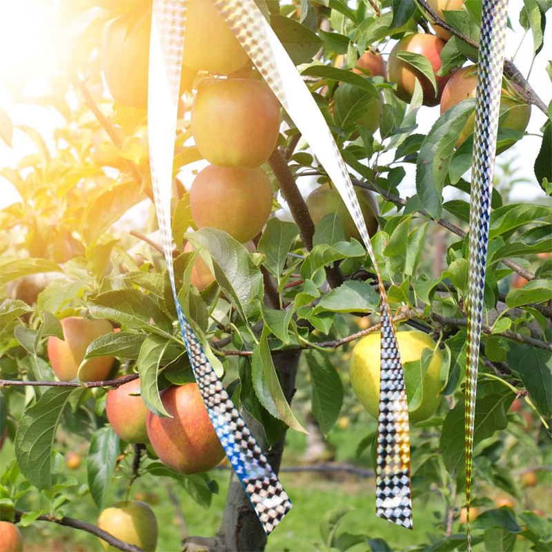 Декоративни градински орнаменти - лента за отблъскване на птици, PET материал, двустранно отражателна, за овощни градини и градини за зеленчуци