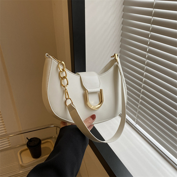 PU anyagú válltáska gombóc alakú dizájnal, poliészter bélés, cipzáras zárás, utcai trend