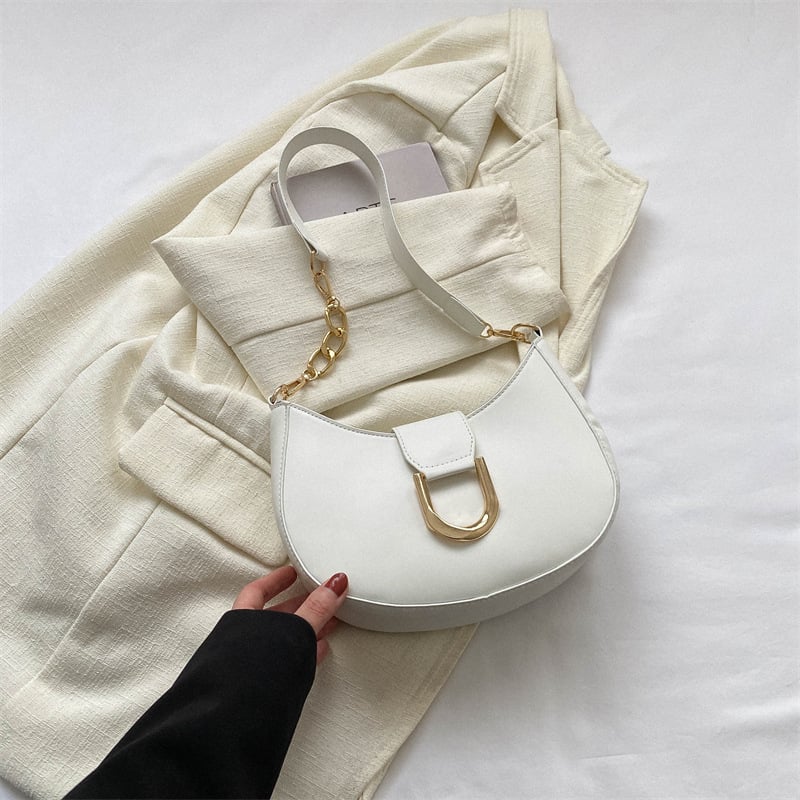 PU anyagú válltáska gombóc alakú dizájnal, poliészter bélés, cipzáras zárás, utcai trend