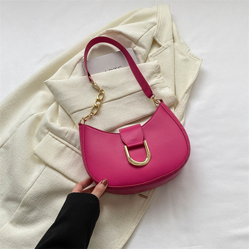 PU anyagú válltáska gombóc alakú dizájnal, poliészter bélés, cipzáras zárás, utcai trend