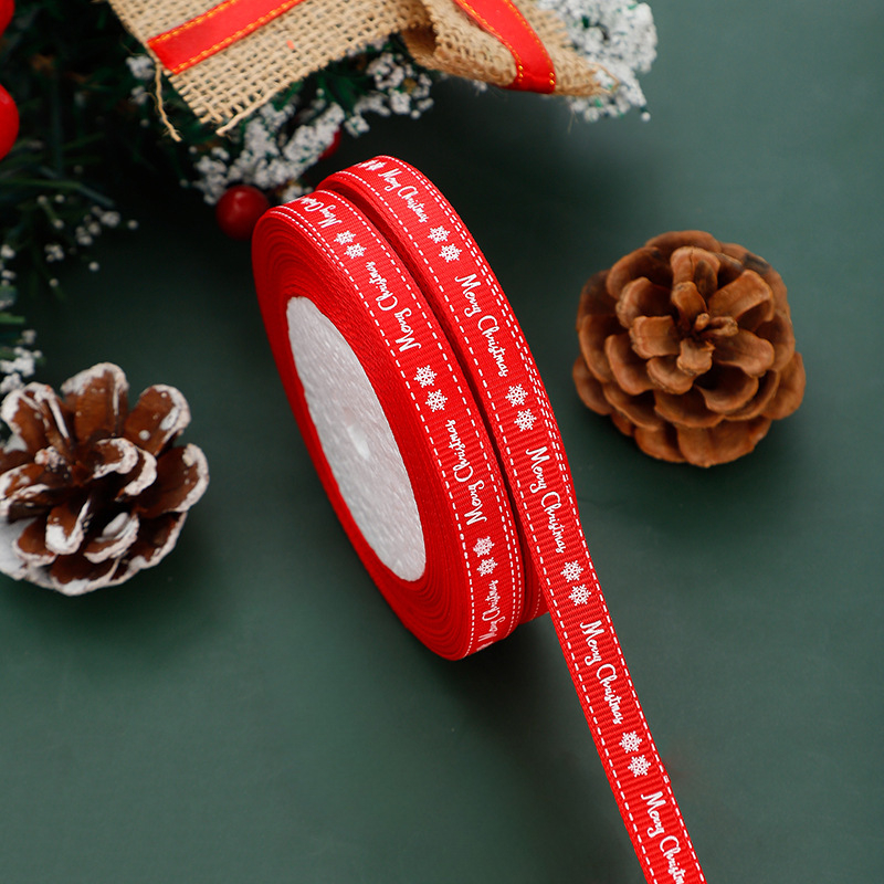 1 cm pločio Kalėdų eglutės motyvo kaspinas su siūlų spauda, raudona ir žalia, skirtas dovanų įvyniojimui