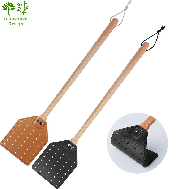 Odinė musėms plaktuvė su ilga bukmedžio rankena — tvirta konstrukcija, netoksiška, personalizavimo galimybė