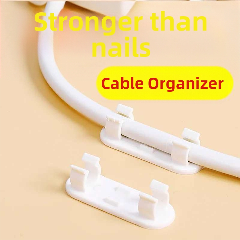 Kábelrendező klip, fúrás nélkül, öntapadós, falra szerelhető (Anyag: műanyag; Stílus: egyéb; Importált: Nem; Kategória: Egyéb rendező és porvédelmi felszerelés)