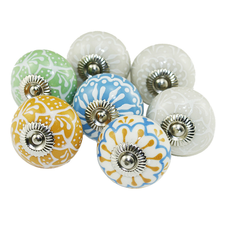 Yunchang στρογγυλή κεραμική λαβή για ντουλάπες και συρτάρια — μοντέρνος μινιμαλιστικός στυλ, ελαφρύς πολυτελής χαρακτήρας; υλικό κεραμικό; επίστρωση ηλεκτροπλατίωσης; μάρκα Yunchang Hardware.