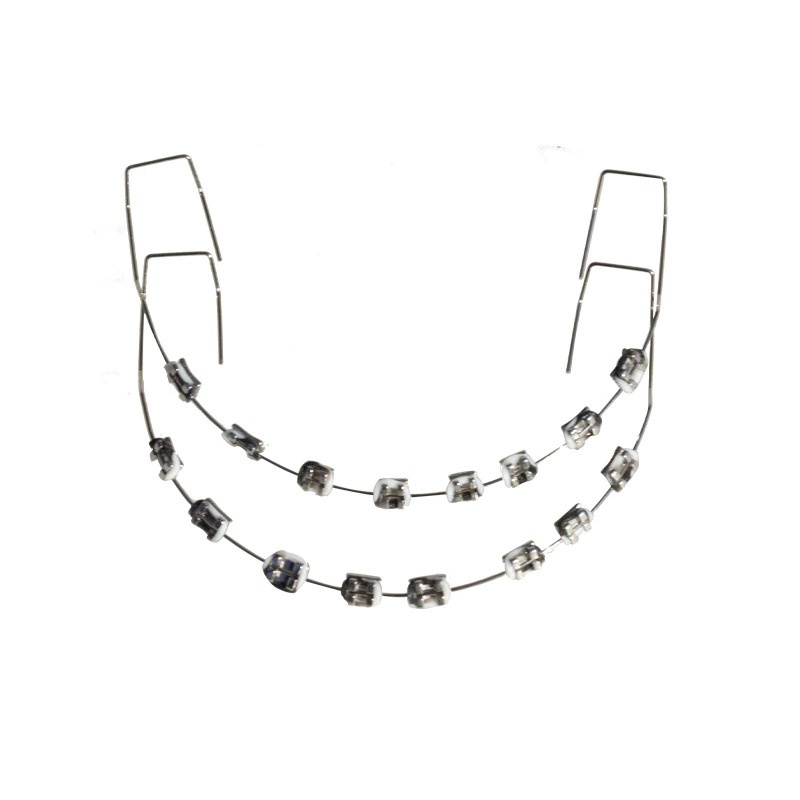 Ortodontikus fém bracket modell bemutatóhoz, felnőtteknek, 140 g, dobozban 100 darab, helyi márka