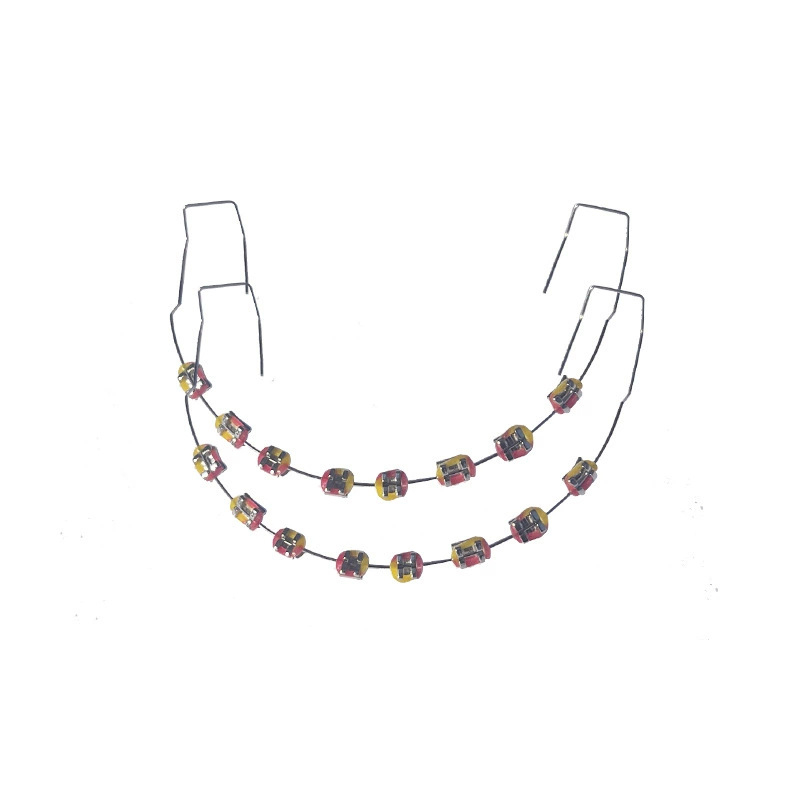 Ortodontikus fém bracket modell bemutatóhoz, felnőtteknek, 140 g, dobozban 100 darab, helyi márka