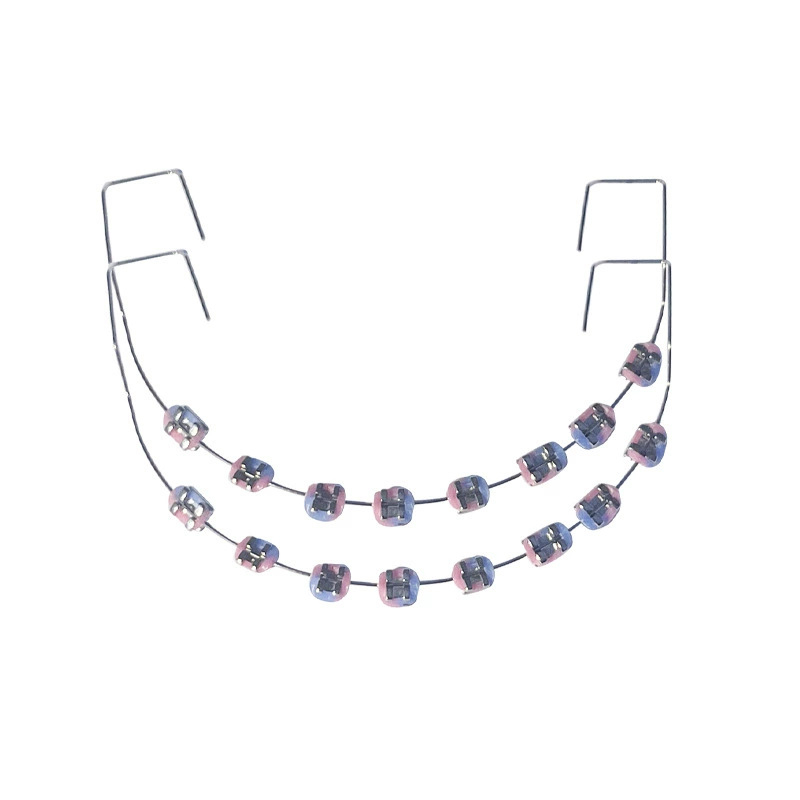 Ortodontikus fém bracket modell bemutatóhoz, felnőtteknek, 140 g, dobozban 100 darab, helyi márka