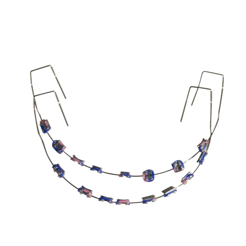 Ortodontikus fém bracket modell bemutatóhoz, felnőtteknek, 140 g, dobozban 100 darab, helyi márka