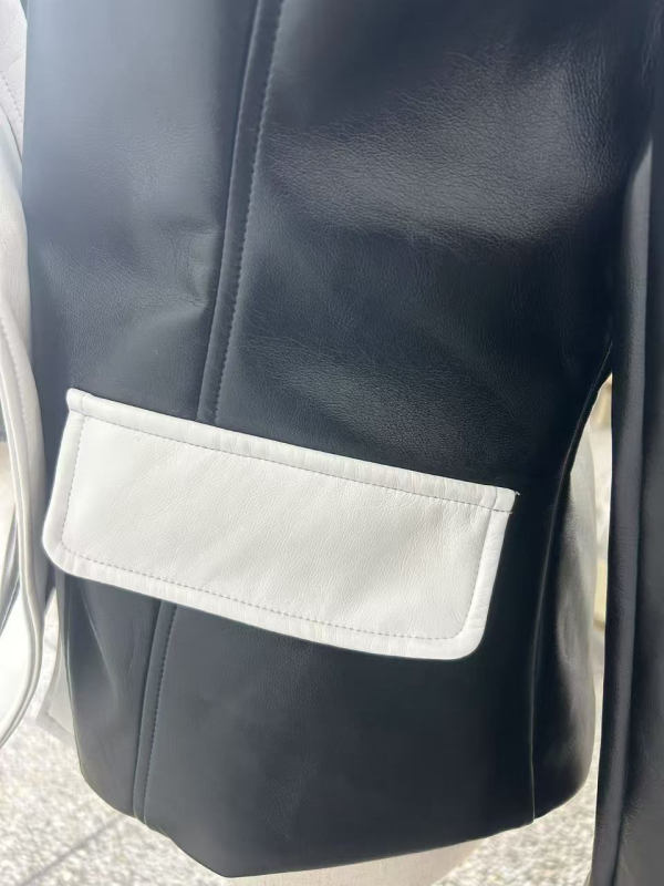 Moteriška PU imitacinės odos striukė su atlapine apykakle, ilgomis rankovėmis, užsegimas vienu mygtuku, poliesteris