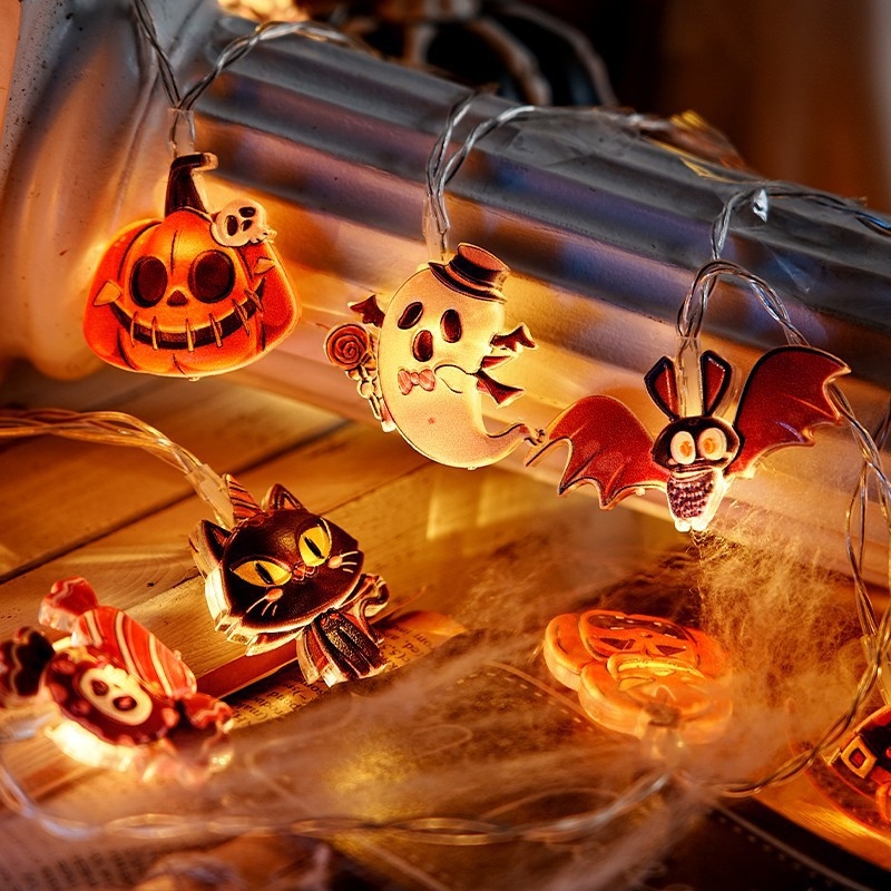 Halloween LED díszítő füzér Cartoon figurákkal: tök, szellem, pók (IP42; akkumulátorról működik; 10–100 LED; ≤36V; élettartam 10000 h)