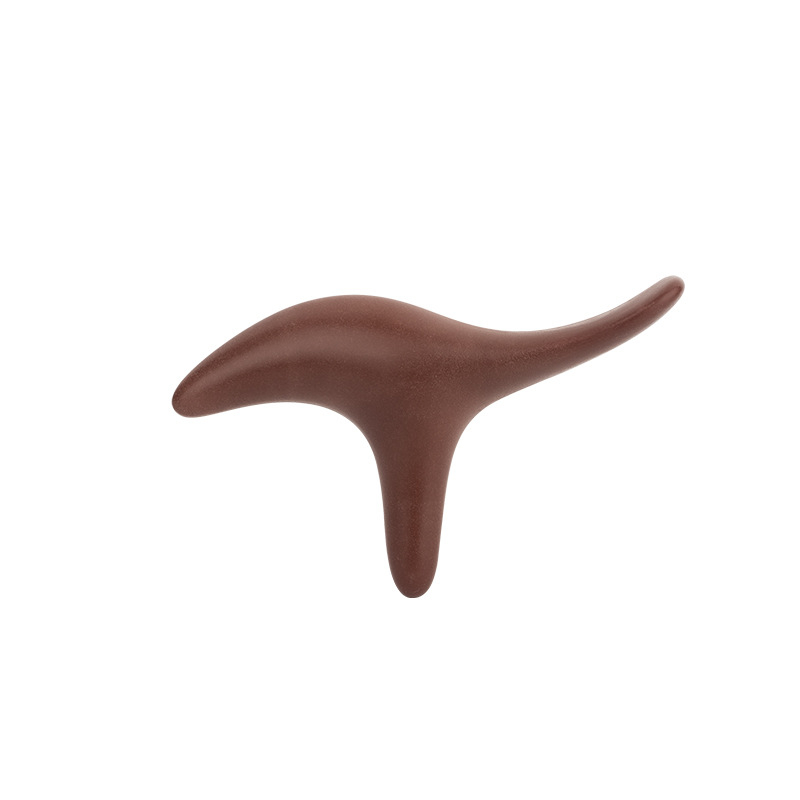 Meridijano masažuoklis su bulių rago forma, rankinė akupunktūros taškų šepetėlis ir pėdų masažas