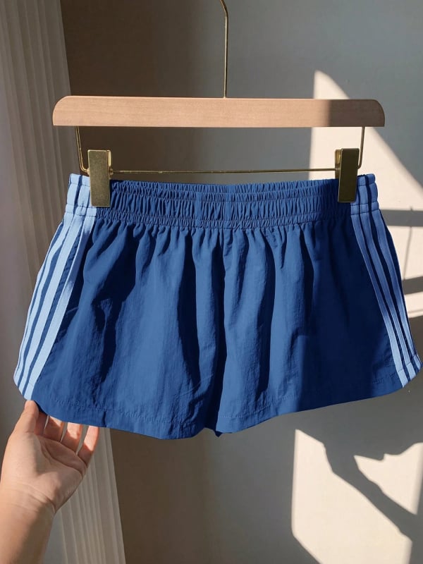 Női lazán szabott sport-casual nadrág, 3/4 hosszú, középmagas derékkal, szövött poliészter anyag 95%+