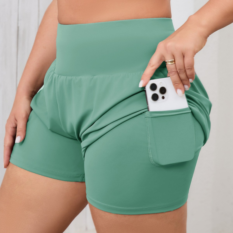 Aukštos juosmens jogos šortai kvėpuojančiame nailono mišinyje 75/25, paslėptos kišenės, tinka jogai ir fitnesui