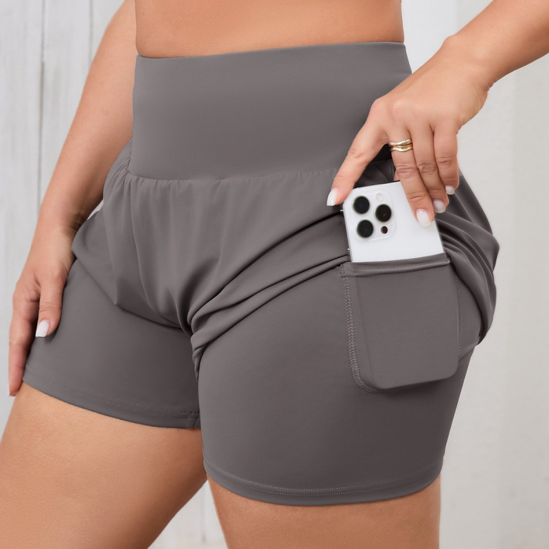 Aukštos juosmens jogos šortai kvėpuojančiame nailono mišinyje 75/25, paslėptos kišenės, tinka jogai ir fitnesui