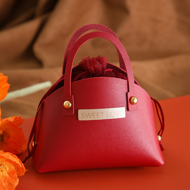 Xingye PU odinė vestuvinė saldumynų maišelė su auksiniu užbaigimu