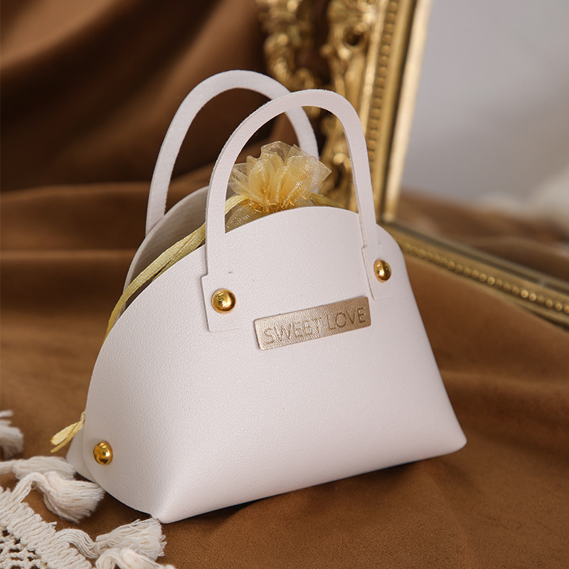 Xingye PU odinė vestuvinė saldumynų maišelė su auksiniu užbaigimu