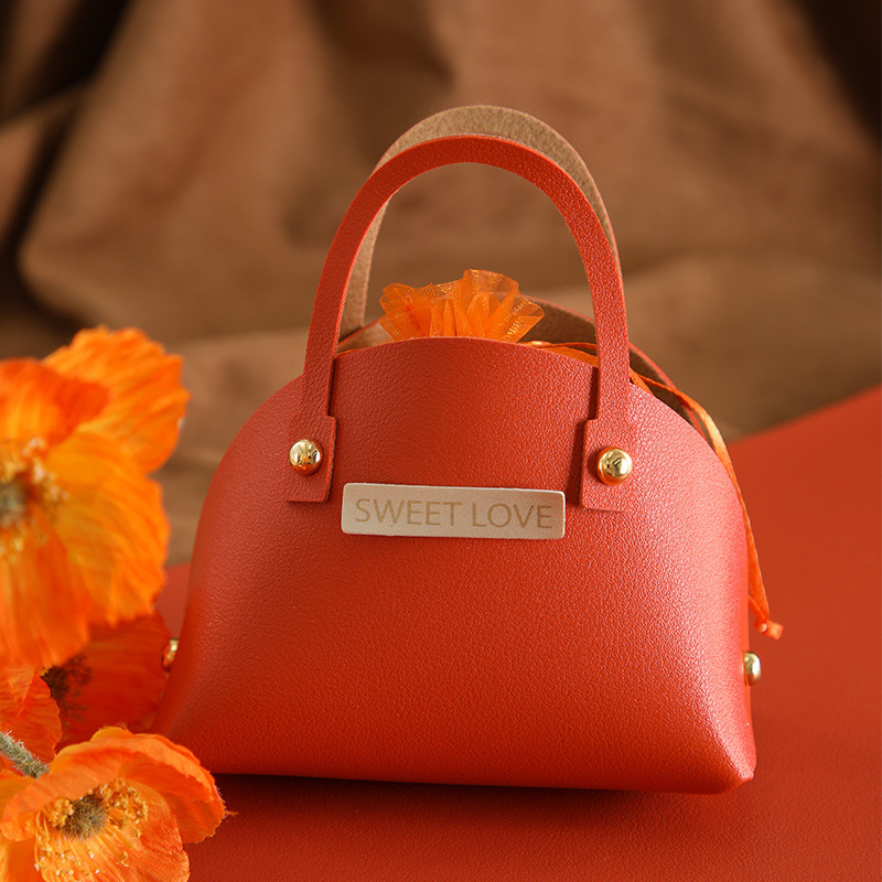 Xingye PU odinė vestuvinė saldumynų maišelė su auksiniu užbaigimu