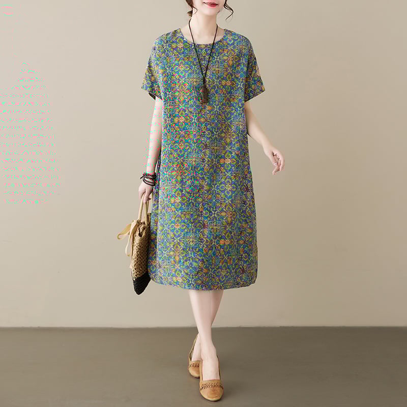 Kokvilnas un lina drukāta kleita ar apaļu kaklu, īsām piedurknēm, brīvu vidukli