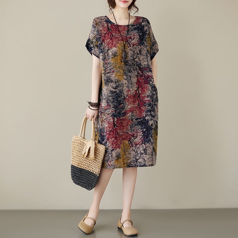 Kokvilnas un lina drukāta kleita ar apaļu kaklu, īsām piedurknēm, brīvu vidukli