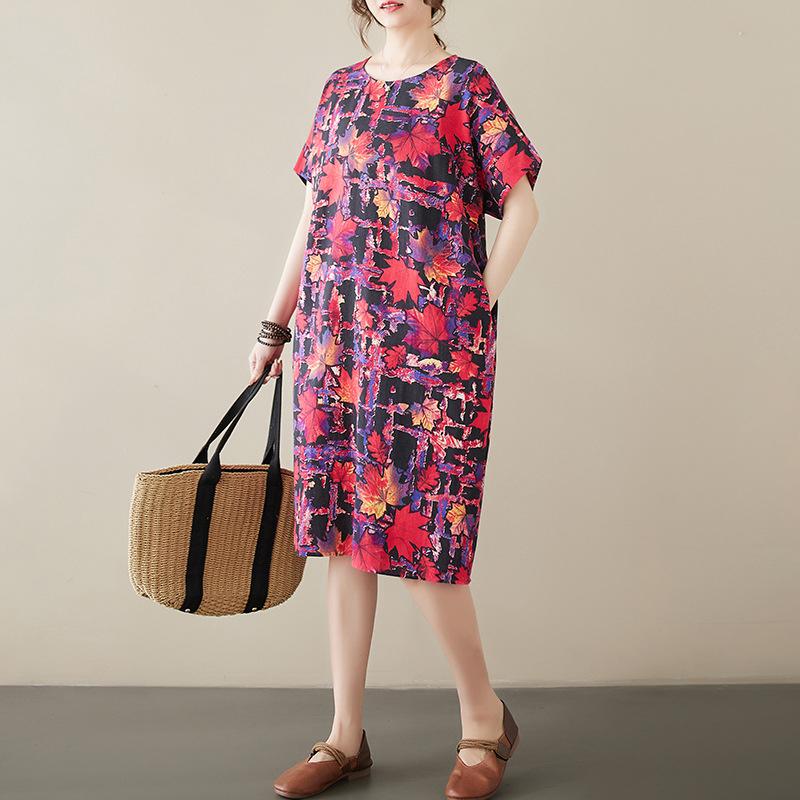 Kokvilnas un lina drukāta kleita ar apaļu kaklu, īsām piedurknēm, brīvu vidukli