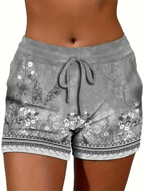 Ženske ljetne kratke hlače s otiskom, opušteni stil — poliester 70–80%, materijal imitacija pamuka, elastičan pojas, duljina pet