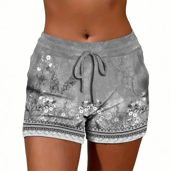 Ženske ljetne kratke hlače s otiskom, opušteni stil — poliester 70–80%, materijal imitacija pamuka, elastičan pojas, duljina pet