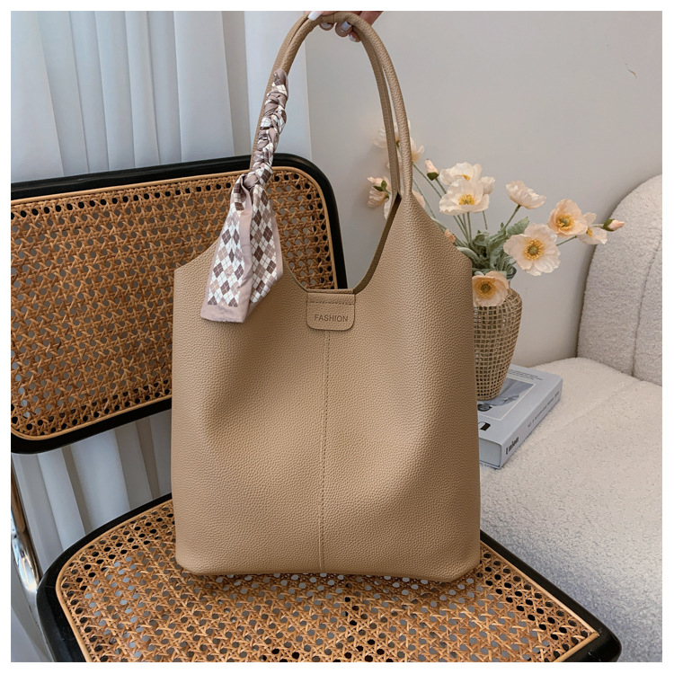 PU bucket táska nőknek, vintage stílus, 2025-ös modell, mágneses zárás, belső cipzáras rekesz, poliészter bélés, dupla vállpánt