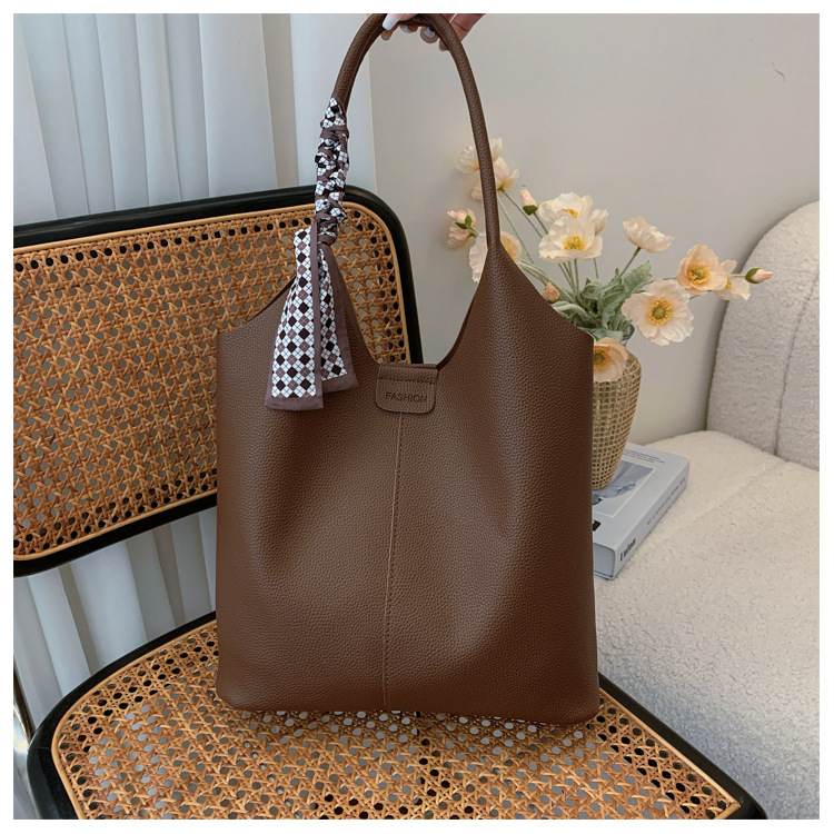 PU bucket táska nőknek, vintage stílus, 2025-ös modell, mágneses zárás, belső cipzáras rekesz, poliészter bélés, dupla vállpánt