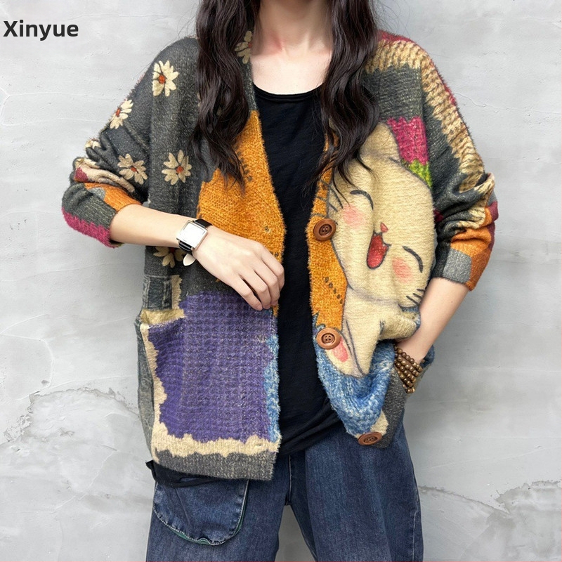 Кардиган от Mink Velvet – V-образно деколте, свободен силует, дълги ръкави, вълнен бленд с 50–70% акрил, принтиране/ боядисване
