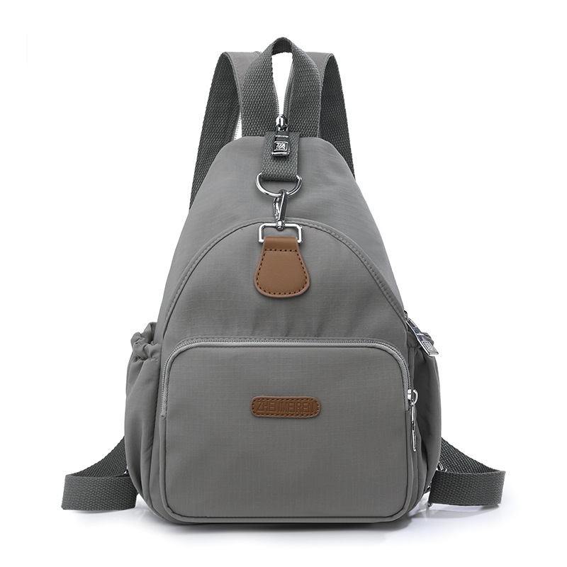 Női válltáska nylonból, poliészter bélés, cipzáras záródás, belső elrendezés: rejtett cipzáras zseb, telefonzseb, személyi igazolvány zseb, Nyár 2025