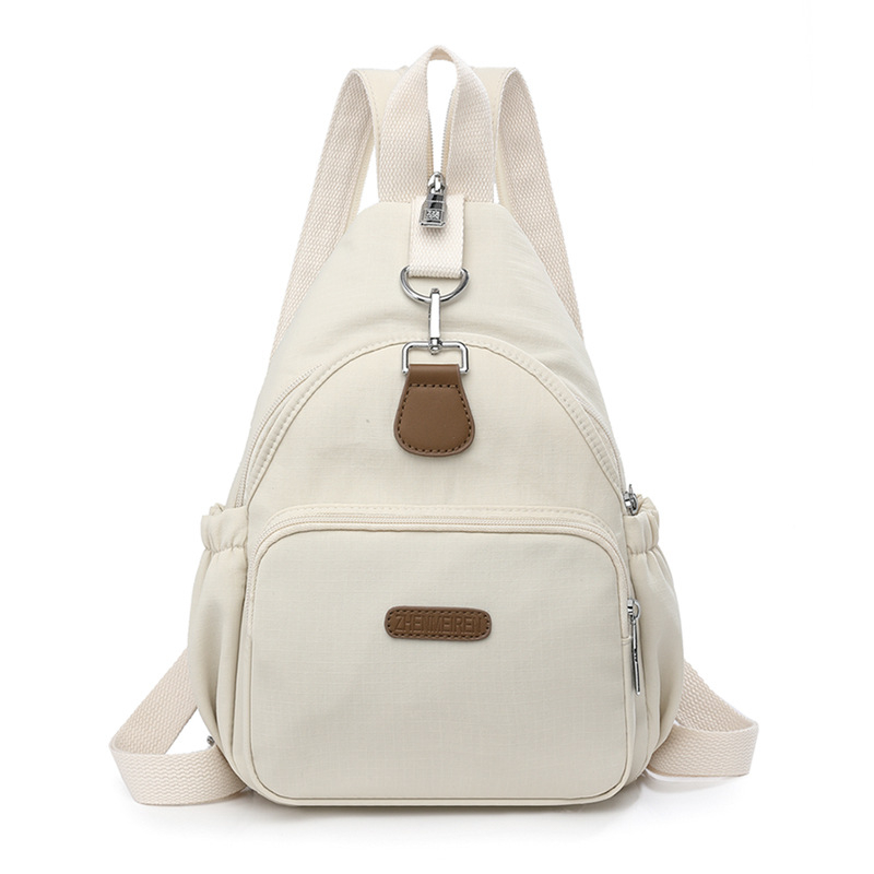 Női válltáska nylonból, poliészter bélés, cipzáras záródás, belső elrendezés: rejtett cipzáras zseb, telefonzseb, személyi igazolvány zseb, Nyár 2025
