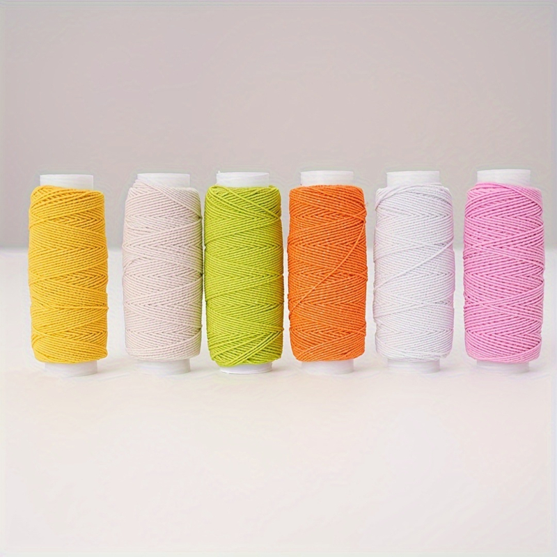 Junori varrógép-elasztikus cérna – Zhejiang eredetű, 100 db dobozban, 10 g tömeg, egyszerű stílus