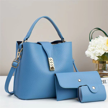 PU anyagú válltáska, bucket stílus, vízszintes négyzet alak, cipzáros nyitás, poliészter bélés