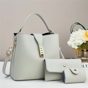 PU anyagú válltáska, bucket stílus, vízszintes négyzet alak, cipzáros nyitás, poliészter bélés