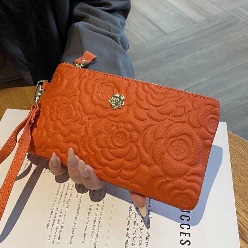 Női bőr clutch táska relief mintával, nagy kapacitású, vízszintes négyzet alakú, cipzáros zárás, belső zsebek telefonhoz és igazolványhoz