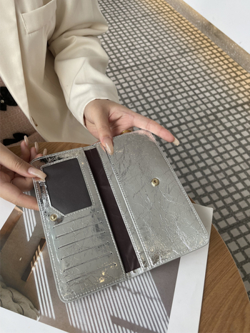 Női hosszú valódi bőrtáska, sokoldalú 2025-ös modell, ultra vékony bőr, kártyatartó, kompakt elegáns csat