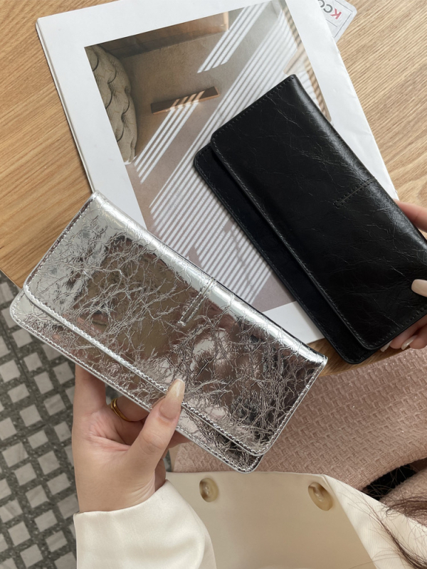 Női hosszú valódi bőrtáska, sokoldalú 2025-ös modell, ultra vékony bőr, kártyatartó, kompakt elegáns csat