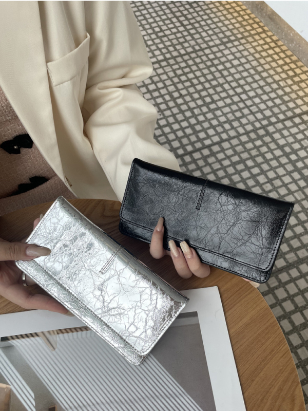 Női hosszú valódi bőrtáska, sokoldalú 2025-ös modell, ultra vékony bőr, kártyatartó, kompakt elegáns csat