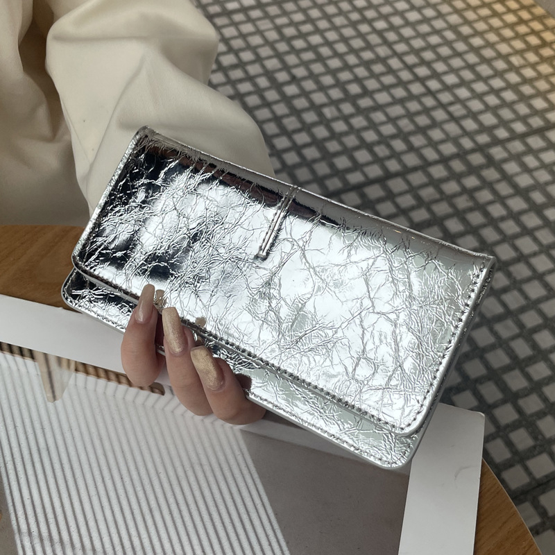 Női hosszú valódi bőrtáska, sokoldalú 2025-ös modell, ultra vékony bőr, kártyatartó, kompakt elegáns csat