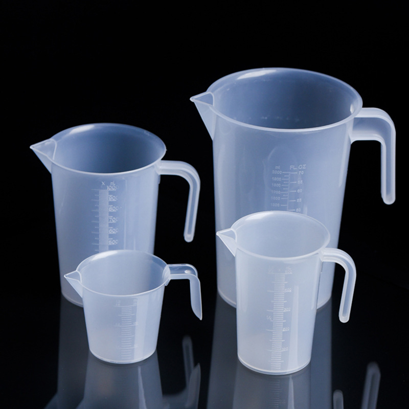 Μετρητικό κύπελλο με καπάκι, ανθεκτικό σε υψηλές θερμοκρασίες, παχύτερο σώμα, διαφανές, με κλίμακα μέτρησης