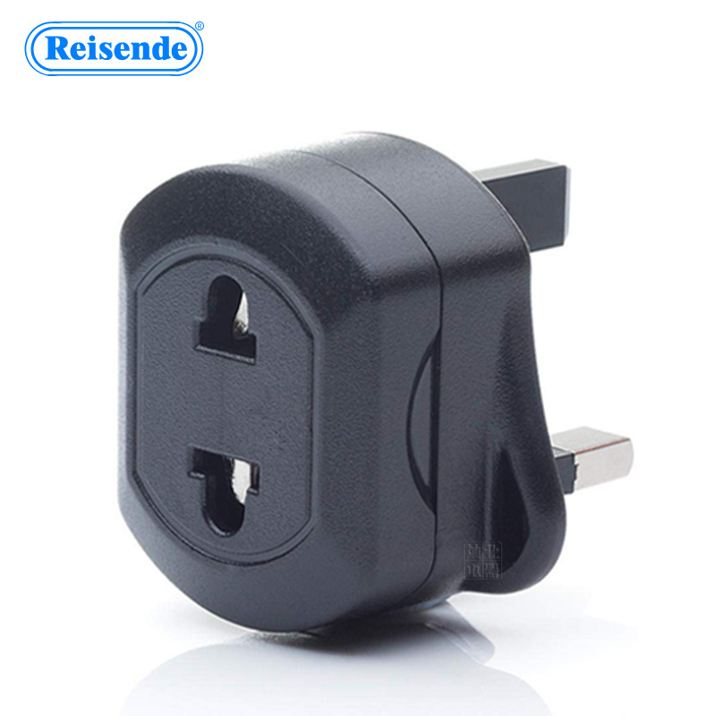 Reisende kelioninis kištukų adapteris iš UK į EU/US su saugikliu
