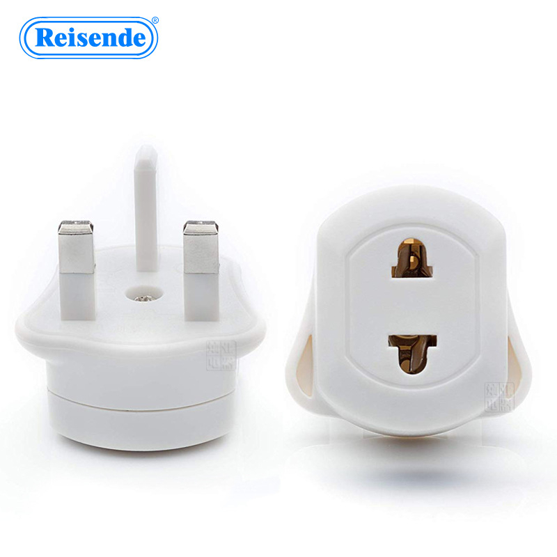 Reisende kelioninis kištukų adapteris iš UK į EU/US su saugikliu