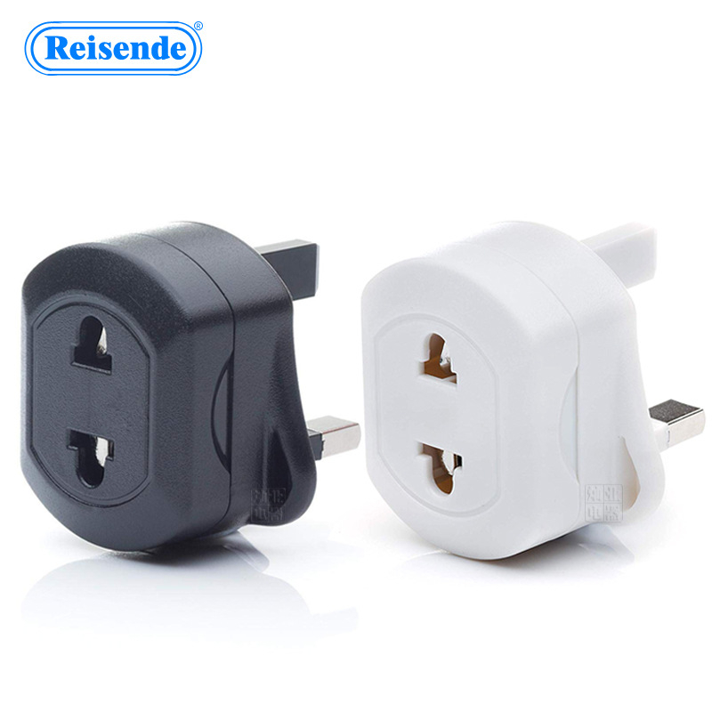 Reisende kelioninis kištukų adapteris iš UK į EU/US su saugikliu