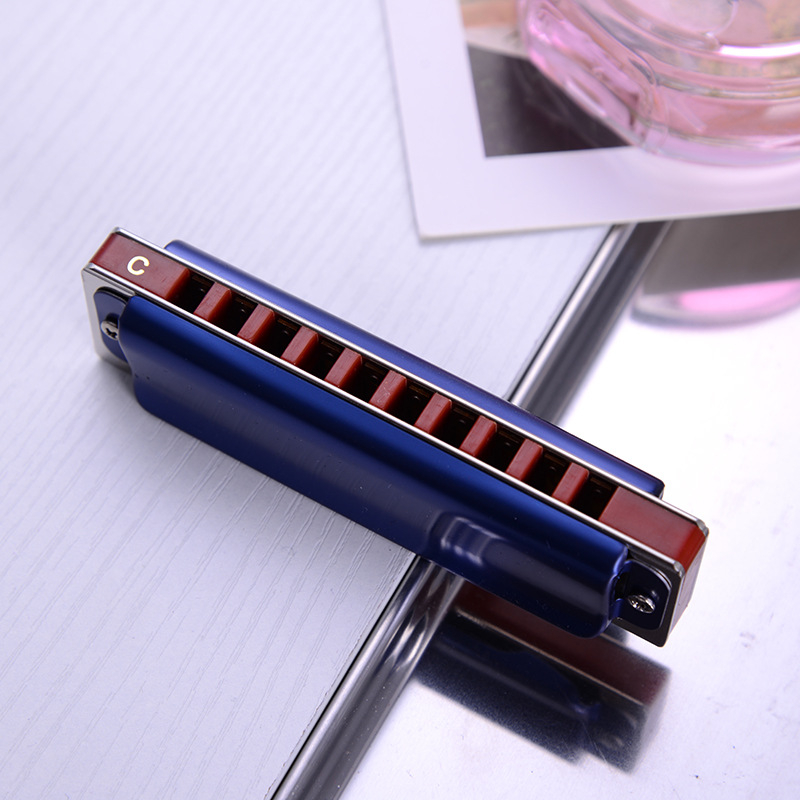 Хармоника за блус, 12-ключова, 10 отвора, капак медно-хромиран, дупки за звучене от смола, тегло 125 g