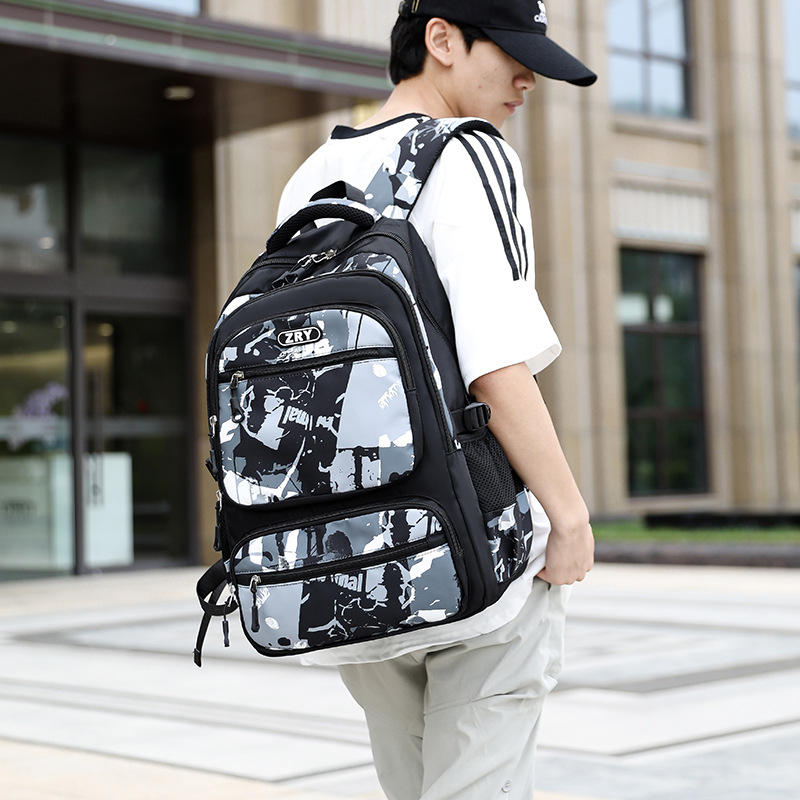 Natural Fish Iskola- és utazó hátizsák, vízálló Oxford anyag, 20–35 L kapacitás, légpárnás vállpántok