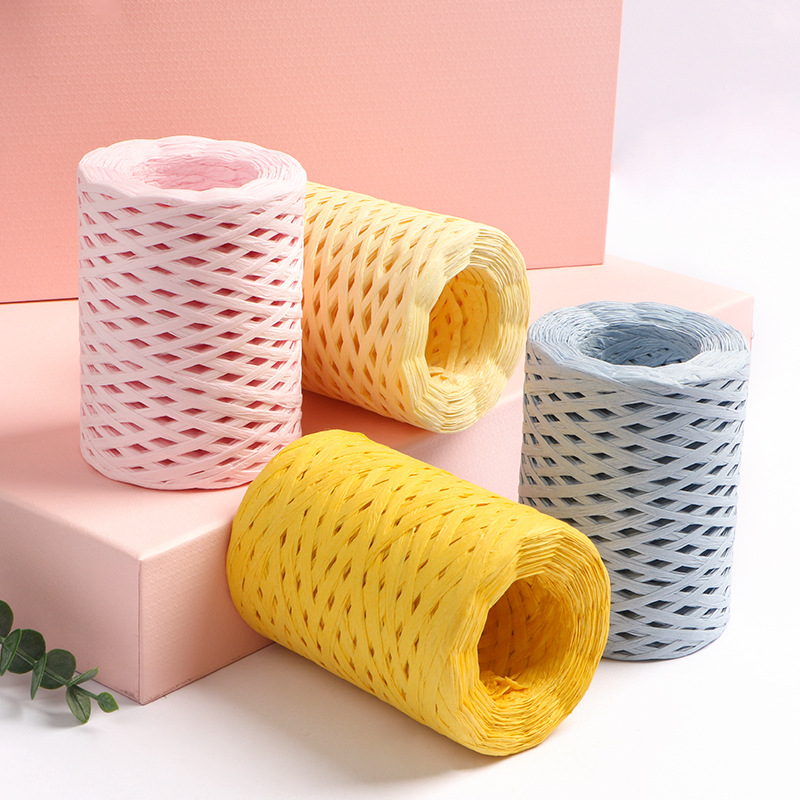 Medvilninė raffija vamzdelinė siūlai — ring spinning, prekės ženklas hiraffia (alias: hiraffia cheer)