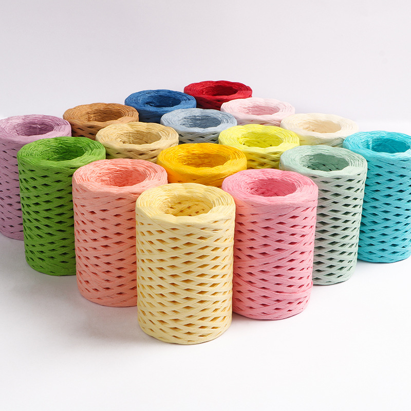 Medvilninė raffija vamzdelinė siūlai — ring spinning, prekės ženklas hiraffia (alias: hiraffia cheer)