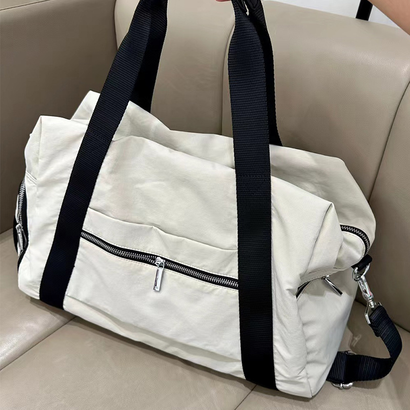 Kültéri utazó válltáska, 36–55L, Oxford anyag, száraz-nedves elkülönítés, poliészter bélés, unisex