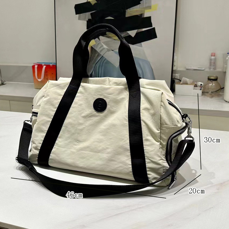 Kültéri utazó válltáska, 36–55L, Oxford anyag, száraz-nedves elkülönítés, poliészter bélés, unisex